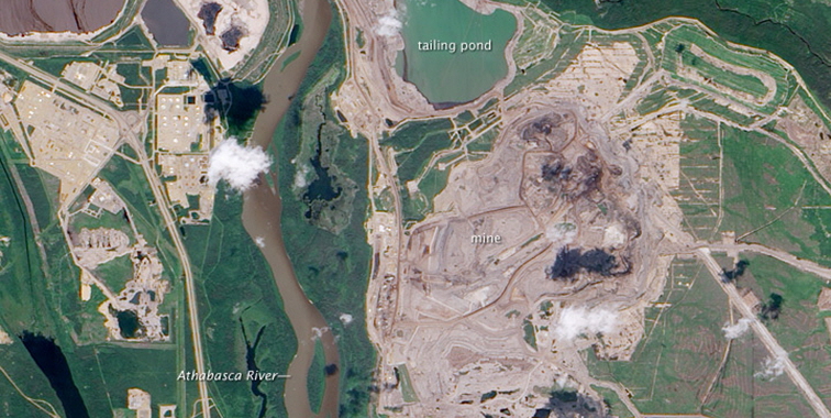 Athabasca Oil Sands in Northern Alberta, photo courtesy of NASA via Wikimedia Commons