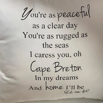 A pillow with a Rita MacNeil quote on it, from Rita's Tea Room, Sydney, NS